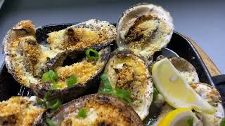Broiled Oysters with garlic butter and Parmesan cheese.