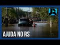 Caminhoneiros ajudam no transporte de moradores em regiões alagadas do Rio Grande do Sul