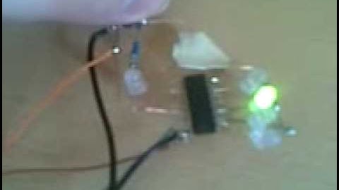 CD4017BE decade counter driving 4x green LEDs.