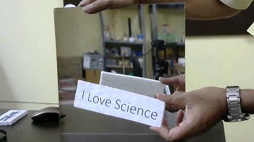 Why do mirrors flip image horizontally and not vertically?