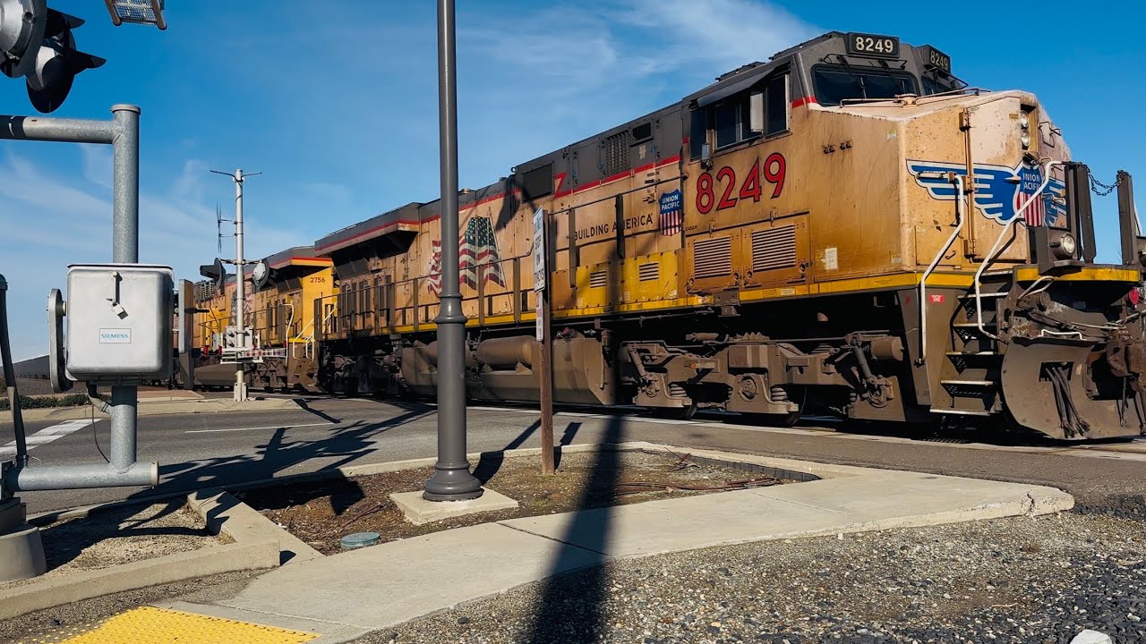 UP 8349 leading gondola train carrying a lot of dust in Florin CA