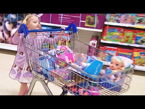 Ava Fills A Trolley Full Of Toys
