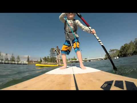 Garver (6) riding a Stand Up Paddleboard