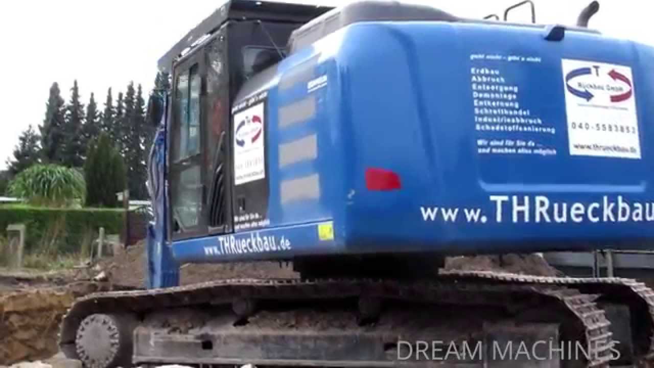 CATERPILLAR 320E BAGGER BELÄDT LKW AUF ABBRUCH BAUSTELLE DREAM MACHINES