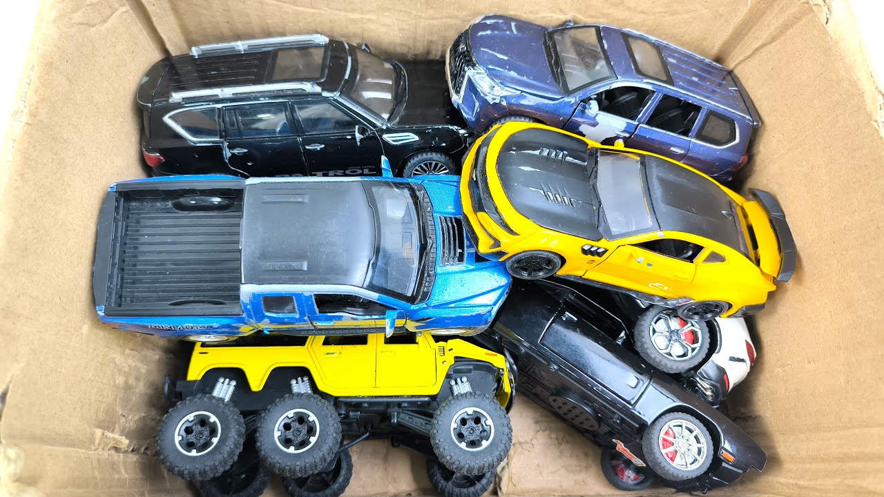 Box Full of Model Cars -Mazda Mx5, Koenigesgg Jesko, Lamborghini Scv12, Byd Yang Wang U8, Toyota Car
