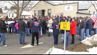 Postal workers firmly stamp their opposition to Saturday closings