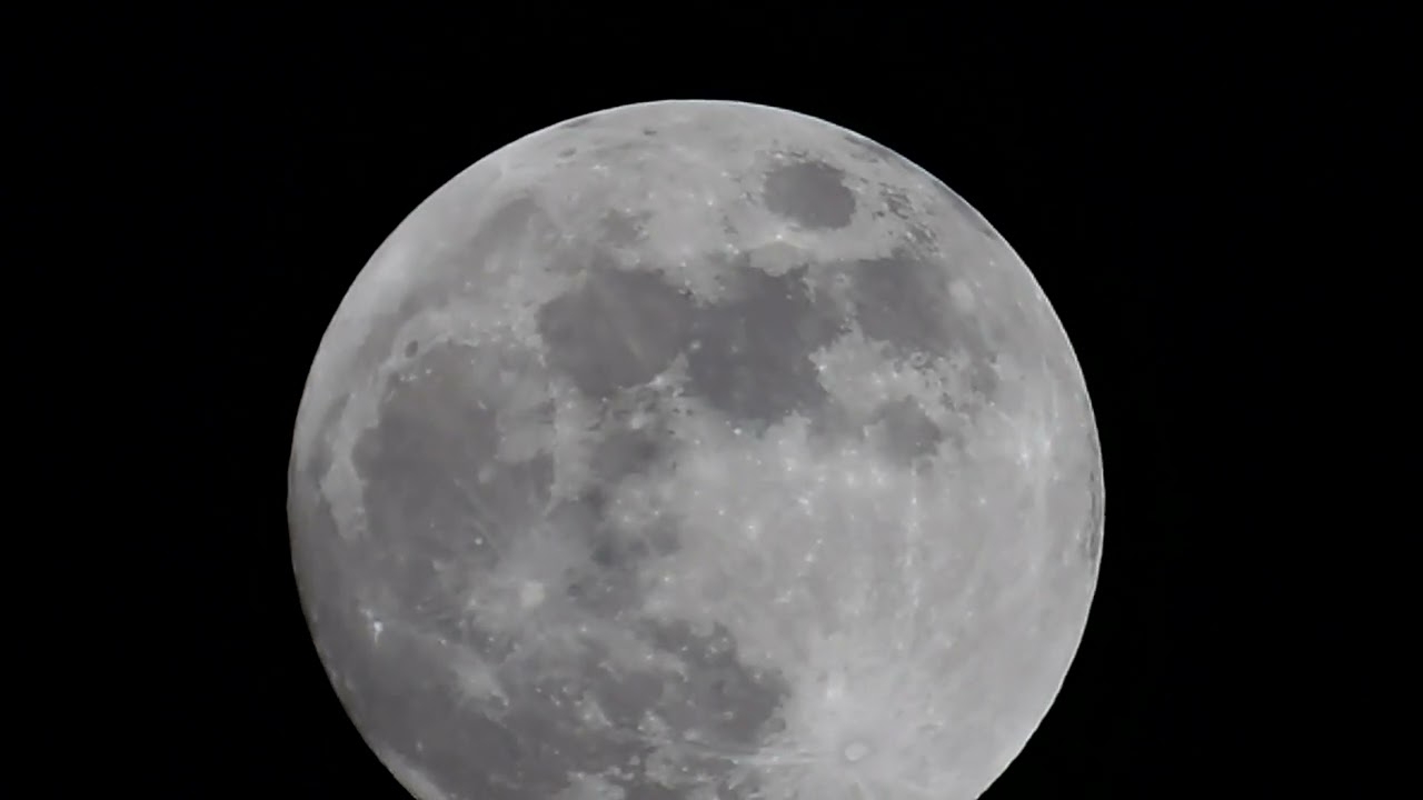 Zooming in on the moon with a kodak pixpro AZ528 camera . I'm