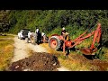 Homemade Backhoe and $500 David Brown Tractor clearing a culvert