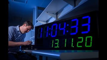 Quantum-Enhanced Clock Synchronisation over a Free-Space Channel