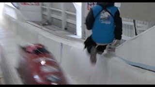 Track worker ALMOST gets taken out by bobsled