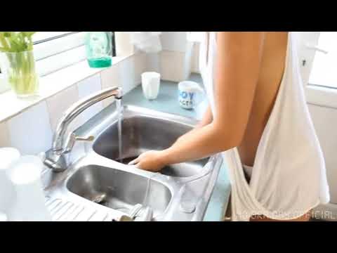 No Bra Day! Spills Out While She's Cleaning