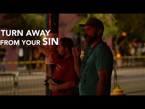 Pastor Preaches to Crowd