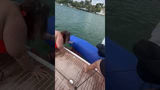 Friends save the day when woman jumps into water and got wrapped up in a mat