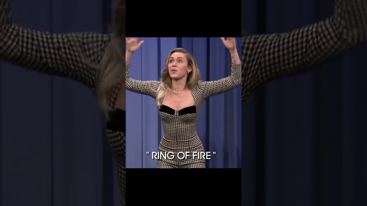 Miley Cyrus ass slap celebration 