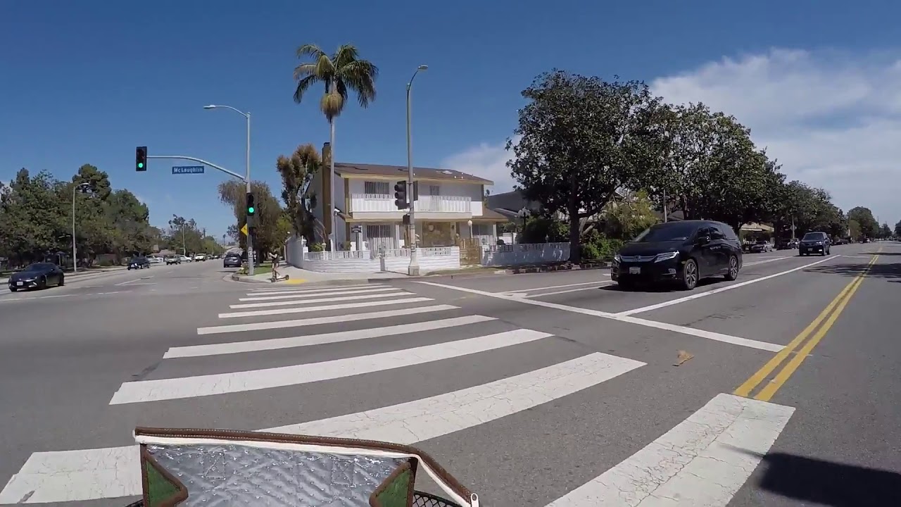 IN CROSSWALK NR PARK WHITE CAR STARTS 2 TURN