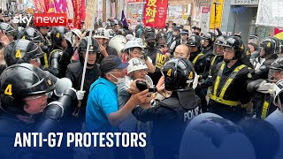 Japan: Anti-G7 protesters scuffle with police in Hiroshima