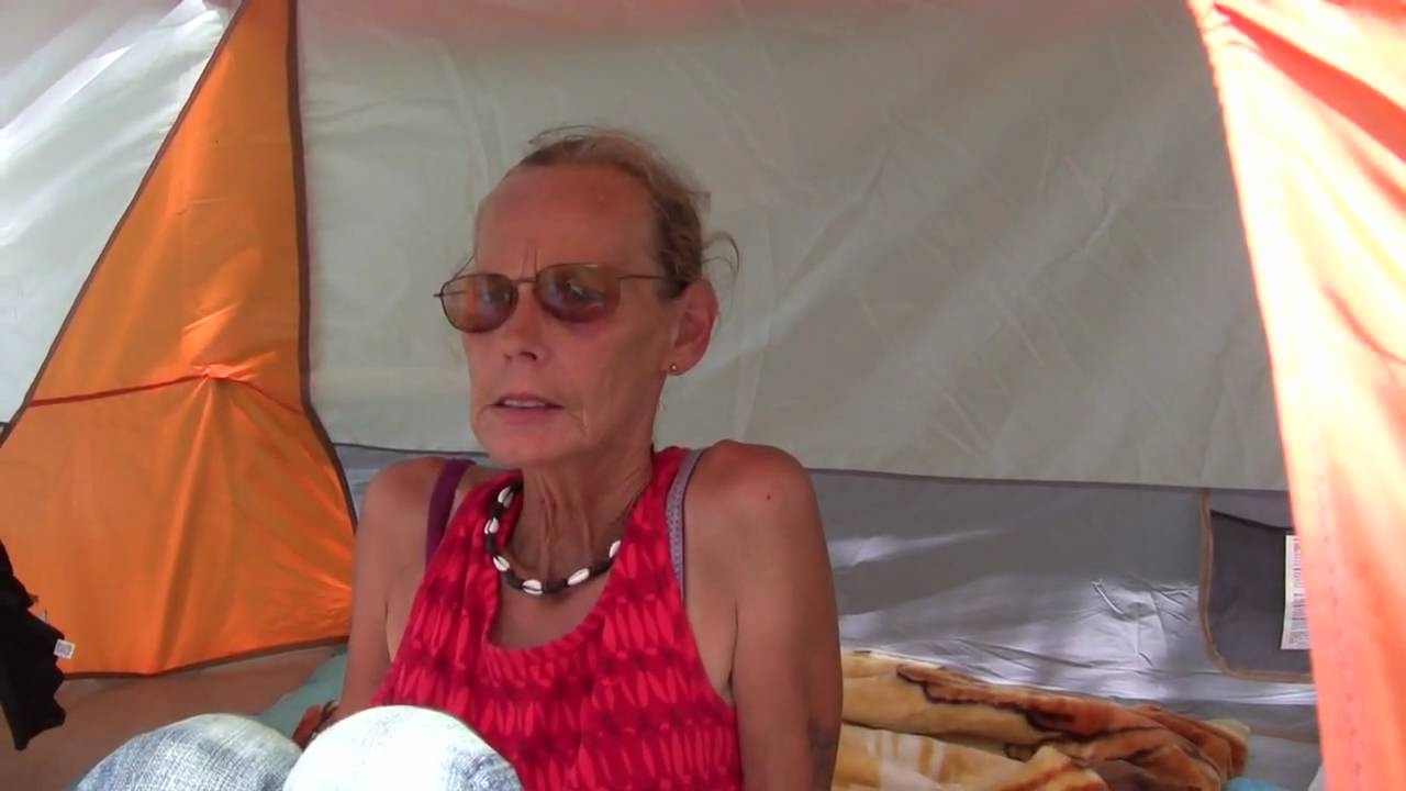 Debbie lives in a tent in a wooded area in Nashville. She is new to homelessness