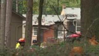 At least one killed as plane crashes into US home