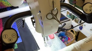 Pro stitcher Cropping the bottom row of an edge to edge design on your quilt. 