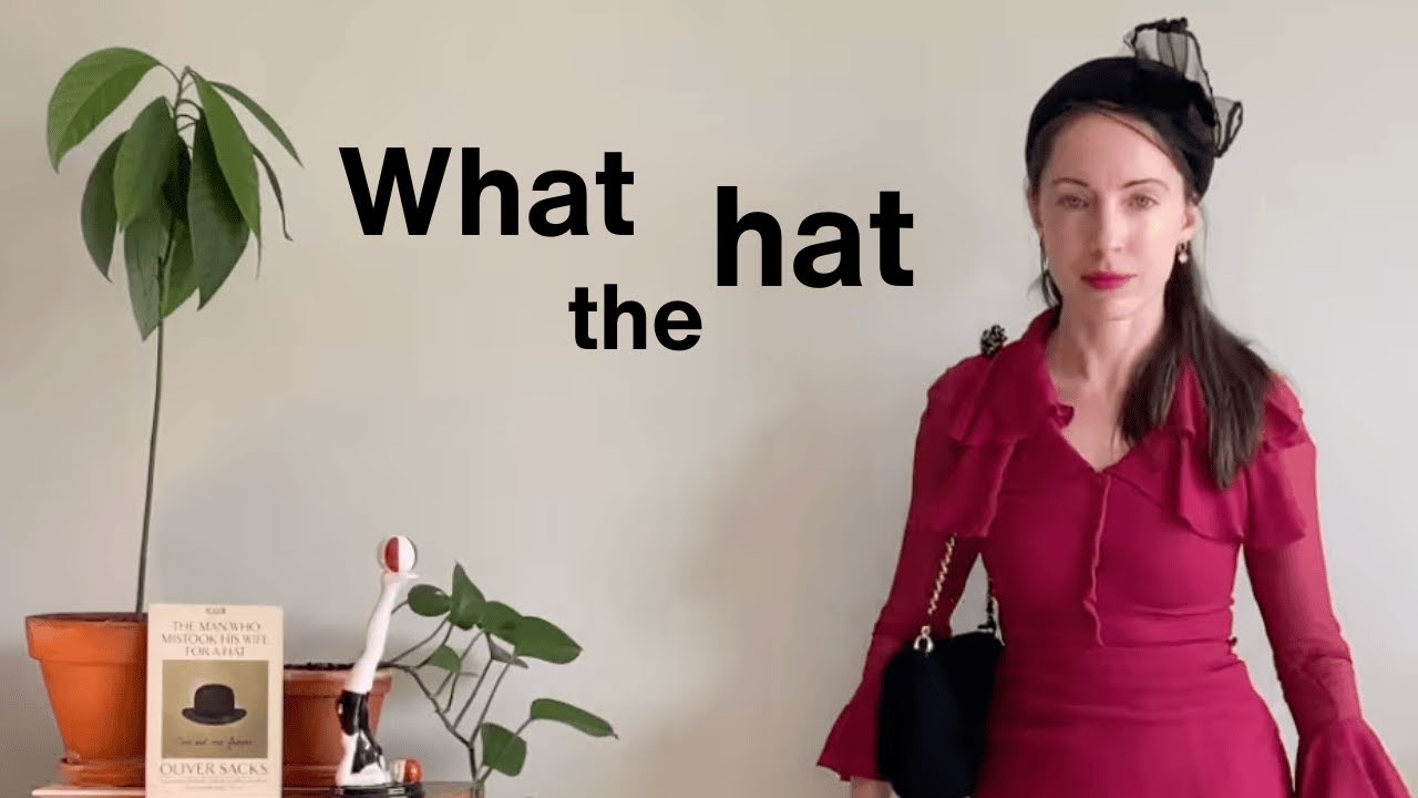 Theatrical Romantic hat try‑on / vintage edition