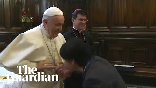 Pope Francis rebuffs worshippers trying to kiss his ring