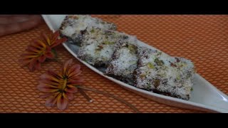 Chocolate Date delight with marie biscuits garnished with dry fruits