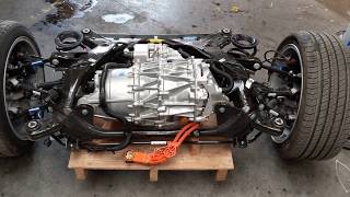 This short clip shows the entire rear subframe complete with drive
unit and suspension pulled from a salvage model 3. itself inverter
and...