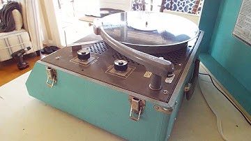 Newcomb record player playing a 33.3 RPM  LP record.