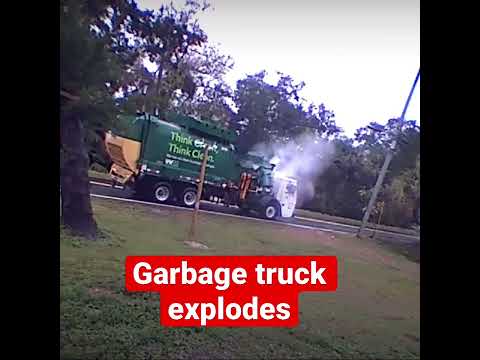 A waste management garbage truck explodes