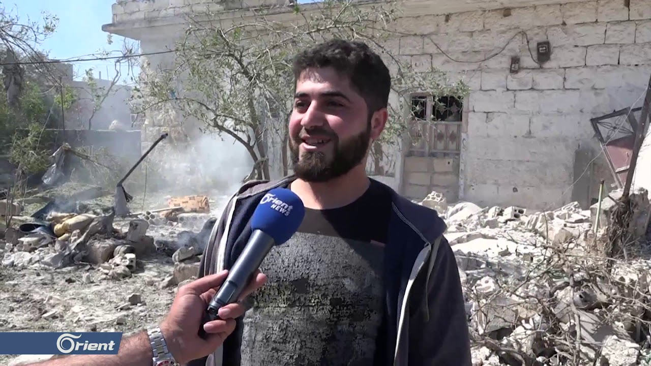 جرحى مدنيون بقصف براميل متفجرة على بلدة حزارين جنوب إدلب - سوريا