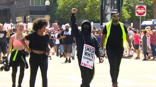 Protesters clash with police after