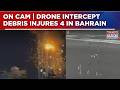 Iran‑US‑Israel War: Drone Intercept Debris Injures 4 In Bahrain, Homes Damaged | Dramatic Visuals