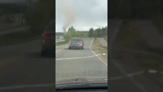 Rare Dust Devil Swirls on Alaska Roadside