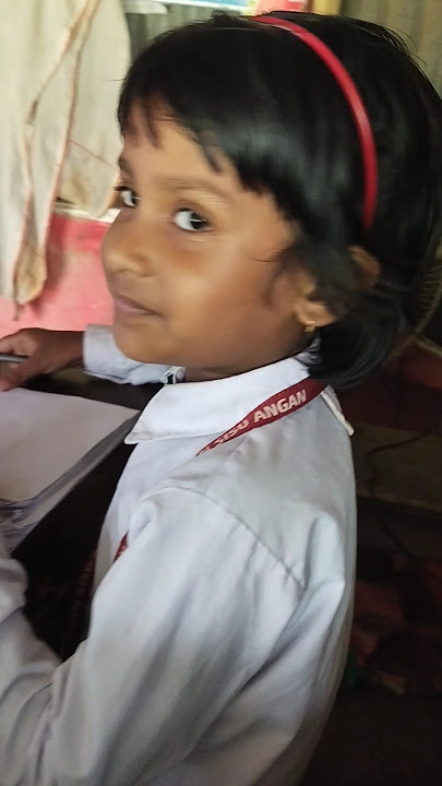 Jayita is looking at the computer and drawing
