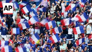 France fans celebrate World Cup semifinal berth after 2-0 Morocco win