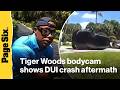 Newly-released Tiger Woods bodycam shows golfer crouching on side of road after DUI crash