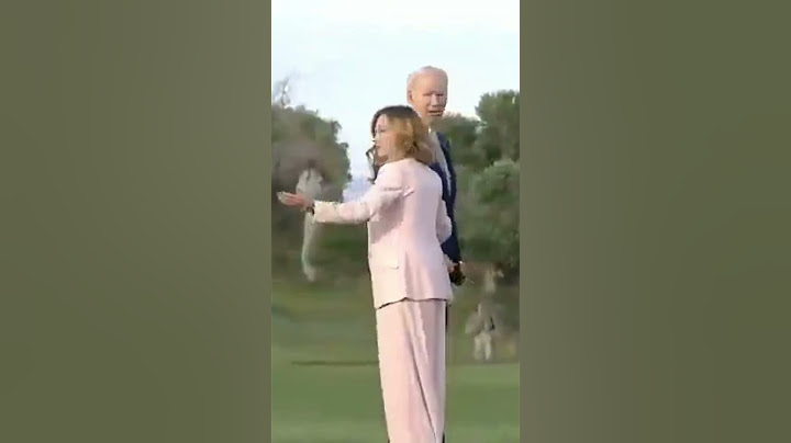 President Biden appears to start wandering off at the G7 summit and has to be handled back in