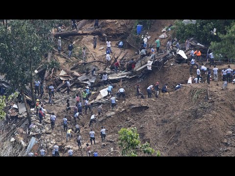 Rescuers search for survivors after typhoon 'Ompong' causes landslide in Benguet