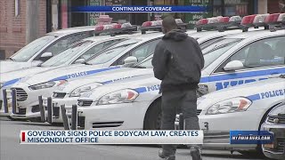Governor signs police bodycam law, creates misconduct office