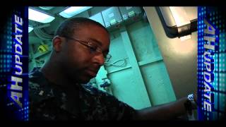 Navy Ensign Prepares For At Sea Officer Qualification Board.