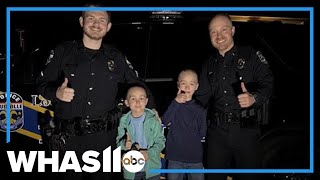Bodycam shows Louisville police officers rescue boy from burning home