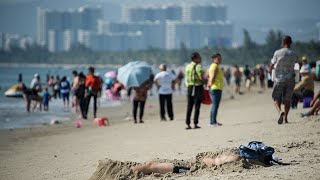 Une île chinoise sous confinement : 80 000 touristes bloqués à Hainan après des cas de Covid