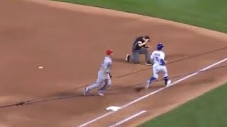 Umpire gets hit in face on errant throw to first base 9\/13\/21