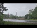 CN 5627 leads 533 through a downpour