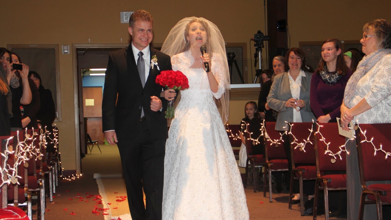 Bride surprises groom by singing down the aisle  Groom WEEPS    One of the first singing brides