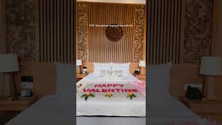 Celebrate love with an enchanting romantic setup adorned with elegant floral arrangements