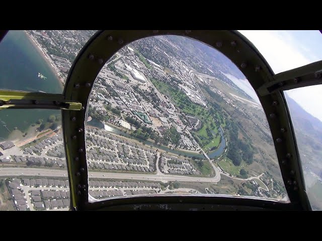 Flying in the back of the B-25 Mitchell Bomber "MAID IN THE SHADE"