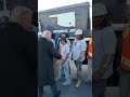 President Donald Trump greeted workers cleaning the Lincoln Memorial Reflecting Pool, shaking hands