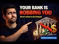 Your Bank Is Paying You $1 a Year — And Making $500 Off Your Money