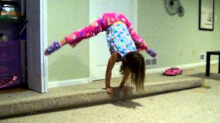 press handstand on beam